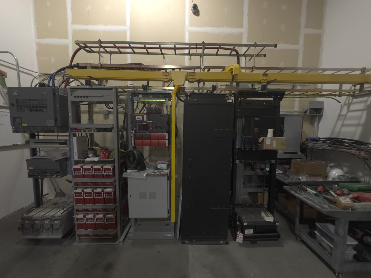 Electrical and network infrastructure room serving AllCom Global Services tenant build-out