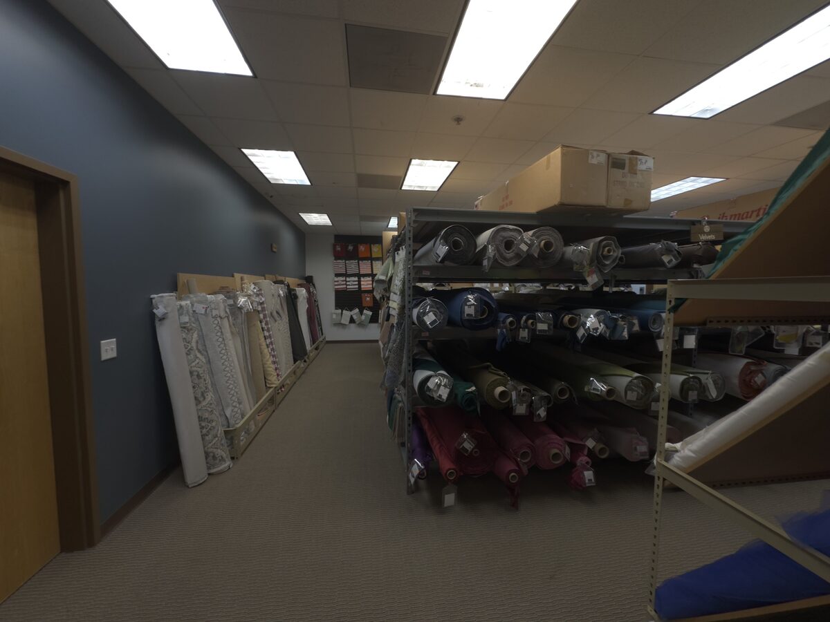 U.S. Fabric Solutions retail showroom with fabric inventory